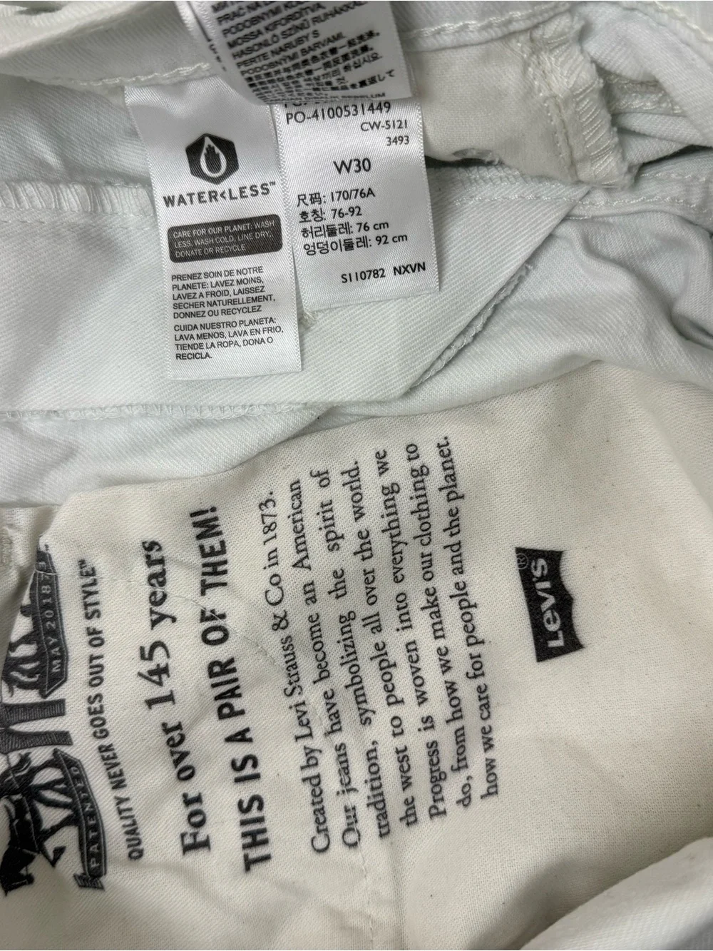 Levi's White Cutoff Denim Shorts with Frayed Hem
